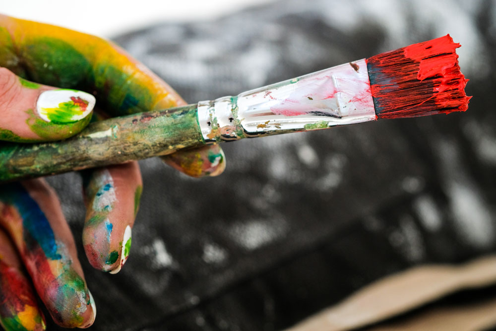 picture of person holding paintbrush