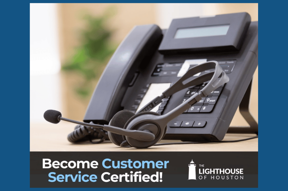 Close-up of a black office phone with a headset resting on the desk, symbolizing customer service communication. Text reads "Become Customer Service Certified! The Lighthouse logo appears bottom right.