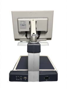 Rear view of an LG monitor mounted on a silver and dark gray stand with various ports visible on the base.